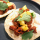 Illustration for article titled How to make homemade tacos al pastor when you don't own a roasting spit